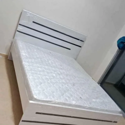 we have wood king size bed with mattress for sale