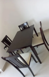 Brand new solid wood dinning table with four chairs for sale