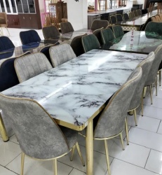 Brand new extendable glass dinning table with six chairs for sale