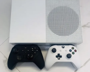 Xbox one s 500 gb with 2 controllers 18 games
