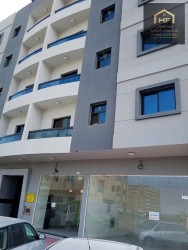For sale, a new and distinctive building in Al Jurf area, Ajman, with a special income and price