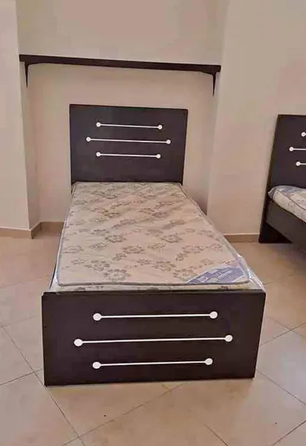 we have wood single size 90x190 bed with mattress for sale
