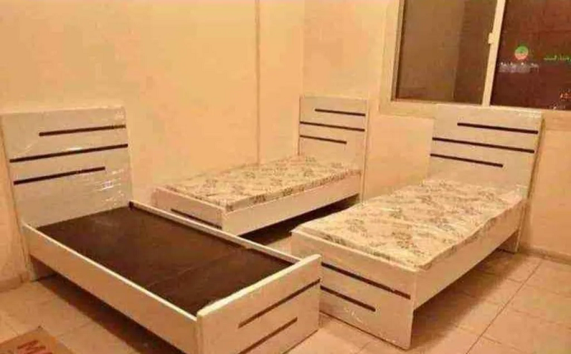 I'm selling brand new MDF wood bed with mattress