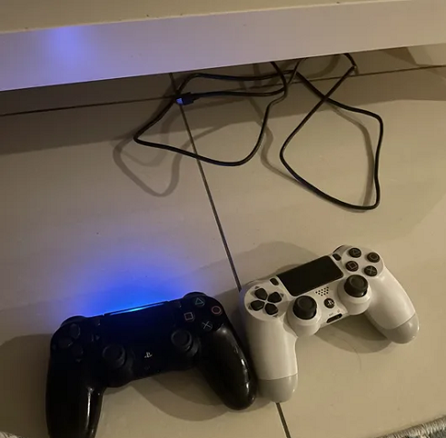 PS4 AND 2 CONTROLLERS AND 3 games