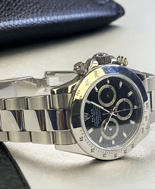 BlackDial Rolex Daytona Cosmograph 116520 with Box/paper