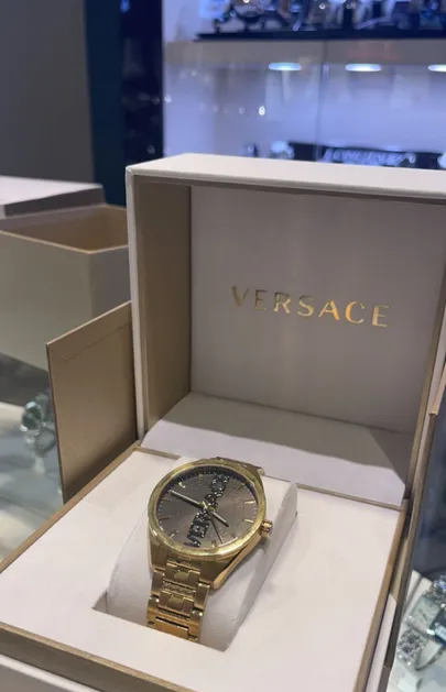 Versace Watch: 18k gold plated