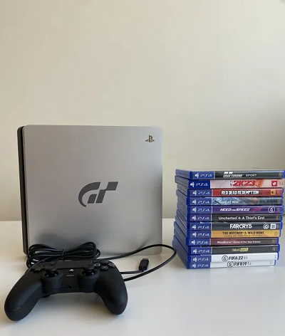 PlayStation 4 Limited Edition Gran Turismo Sport with 12 games and controller for sale